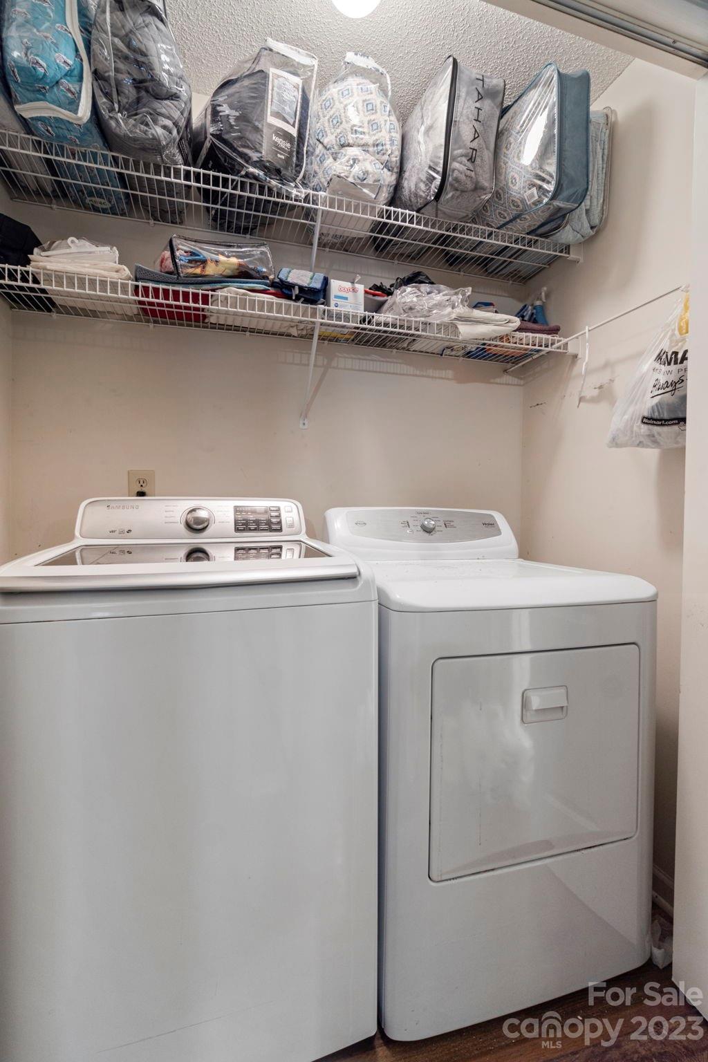 1007 Charcoal Ridge Court Matthews, NC 28105 - Photo 15 of 16 a utility room with dryer and washer