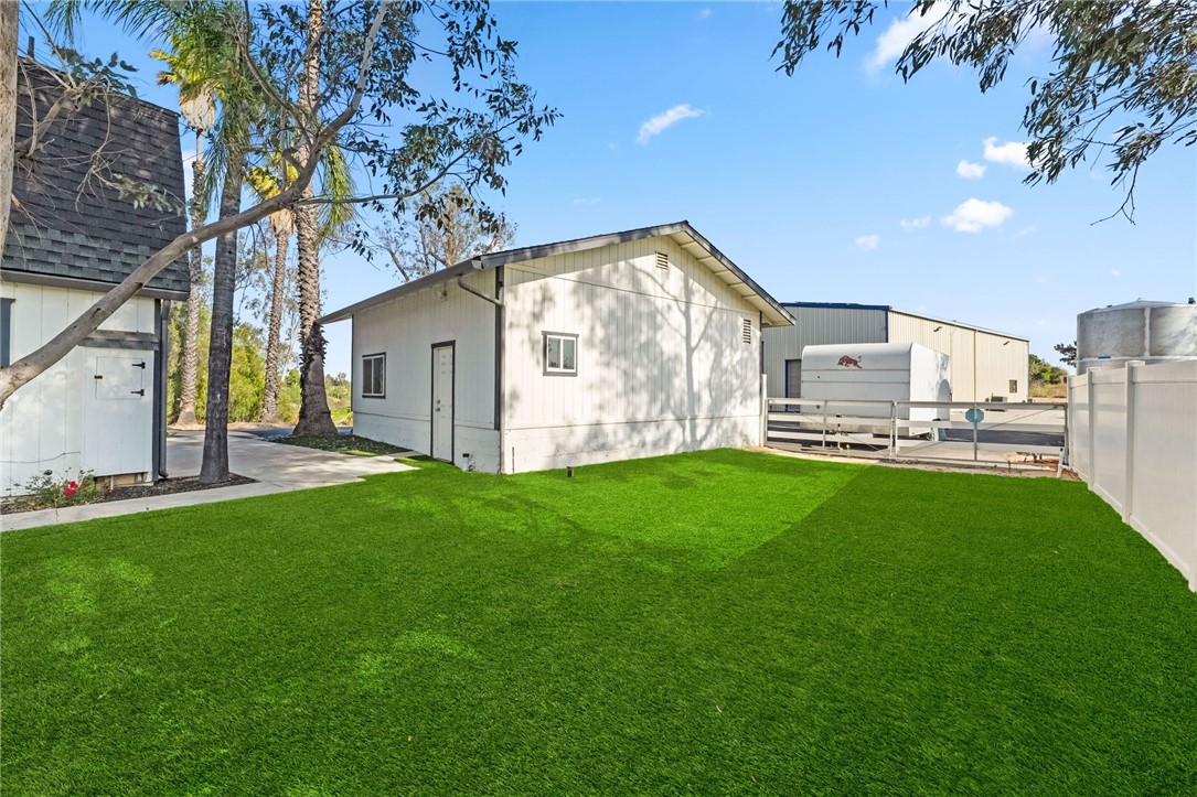 35825 Meadow Ridge Road Temecula, CA 92592 - Photo 56 of 75 a front view of house with yard and green space