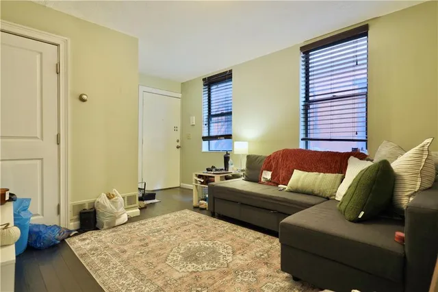 a living room with furniture and a couch