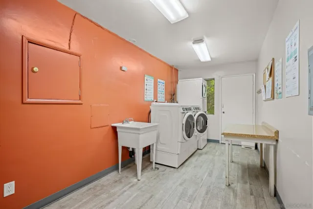 a workspace with furniture and wooden floor