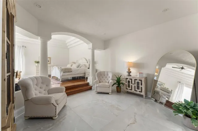 a bathroom with a tub sink toilet and shower
