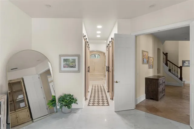 a bathroom with double sink and a mirror