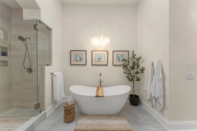 a bathroom with a sink mirror toilet and shower