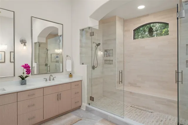 a view of a bedroom with wooden floor and cabinet