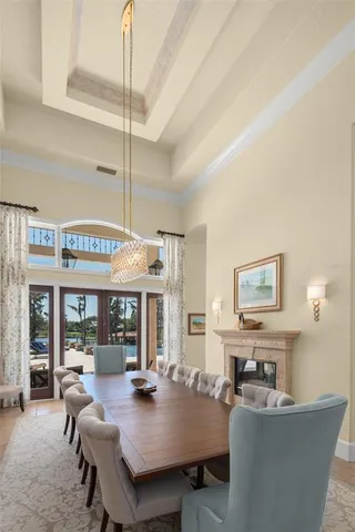 a view of a dining room with furniture and a table