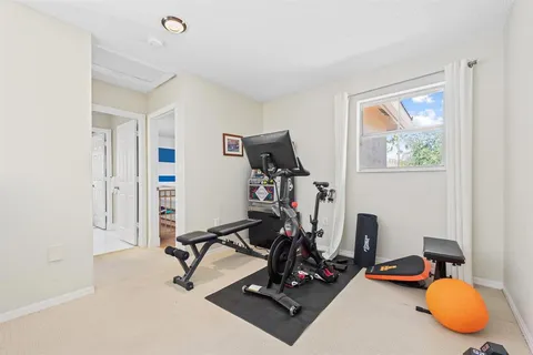 a view of a room with gym equipment