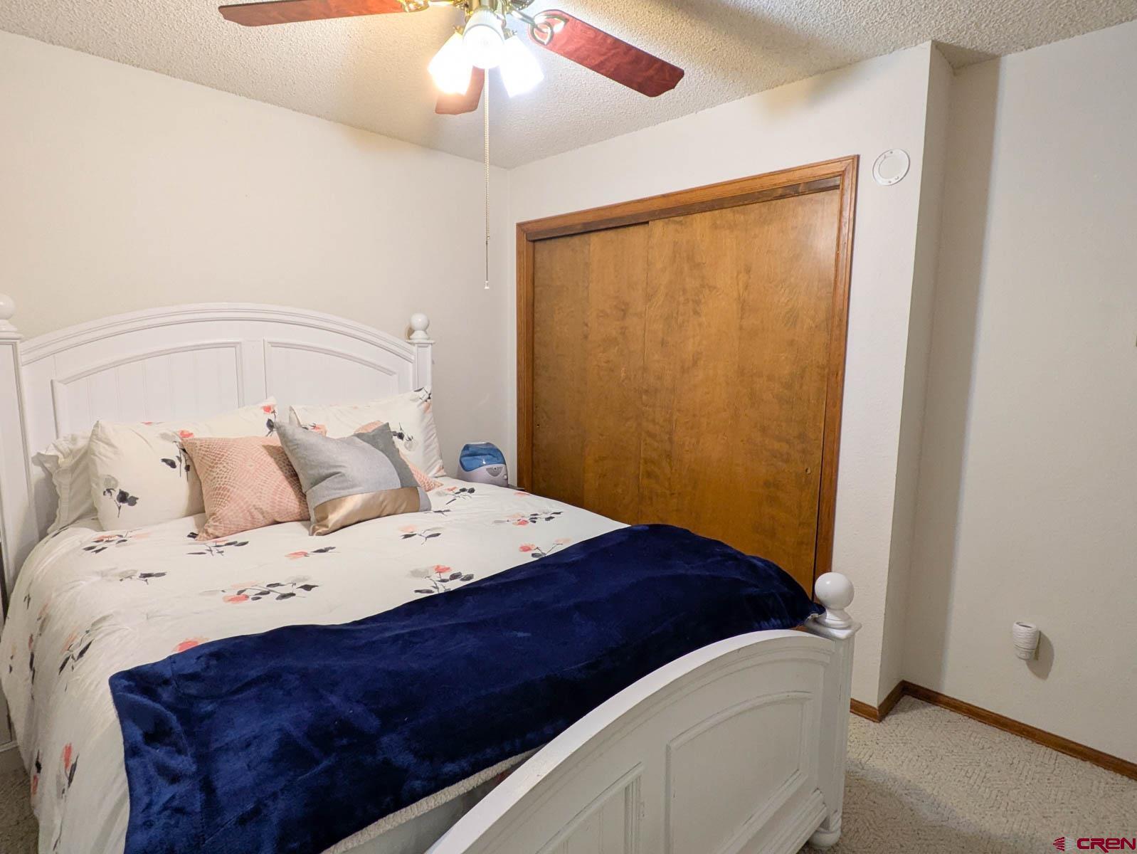 39594 Pitkin Road Paonia, CO 81428 - Photo 17 of 35 a view of bedroom with furniture and wooden floor