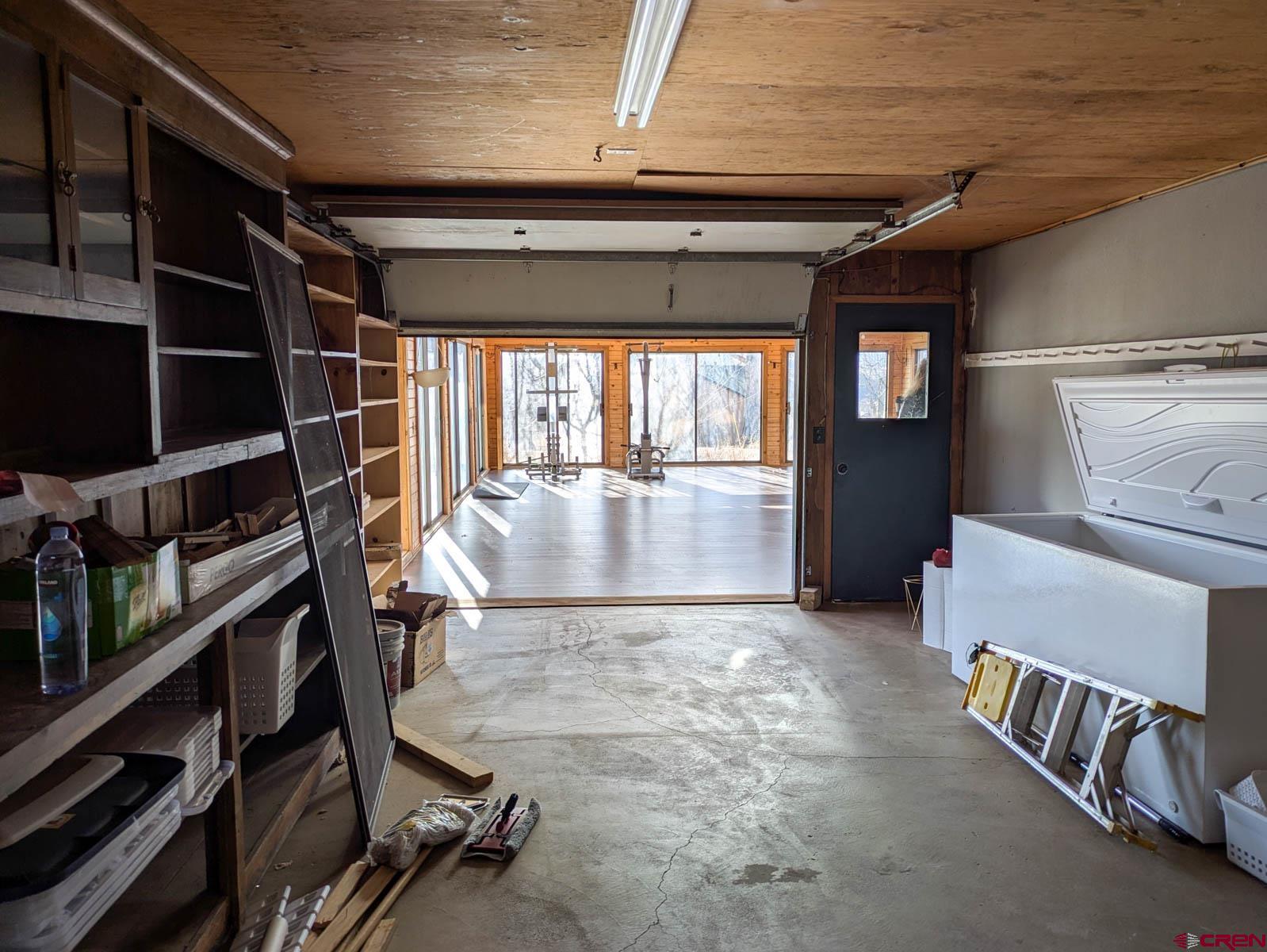 39594 Pitkin Road Paonia, CO 81428 - Photo 25 of 35 a view of an empty room with a staircase