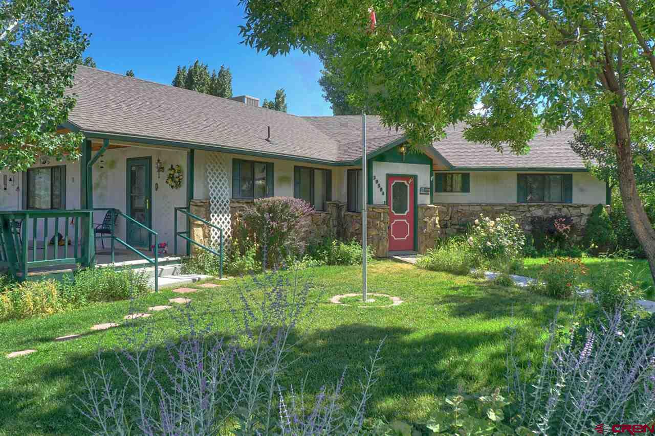 39594 Pitkin Road Paonia, CO 81428 - Photo 33 of 35 a view of front of house with a yard