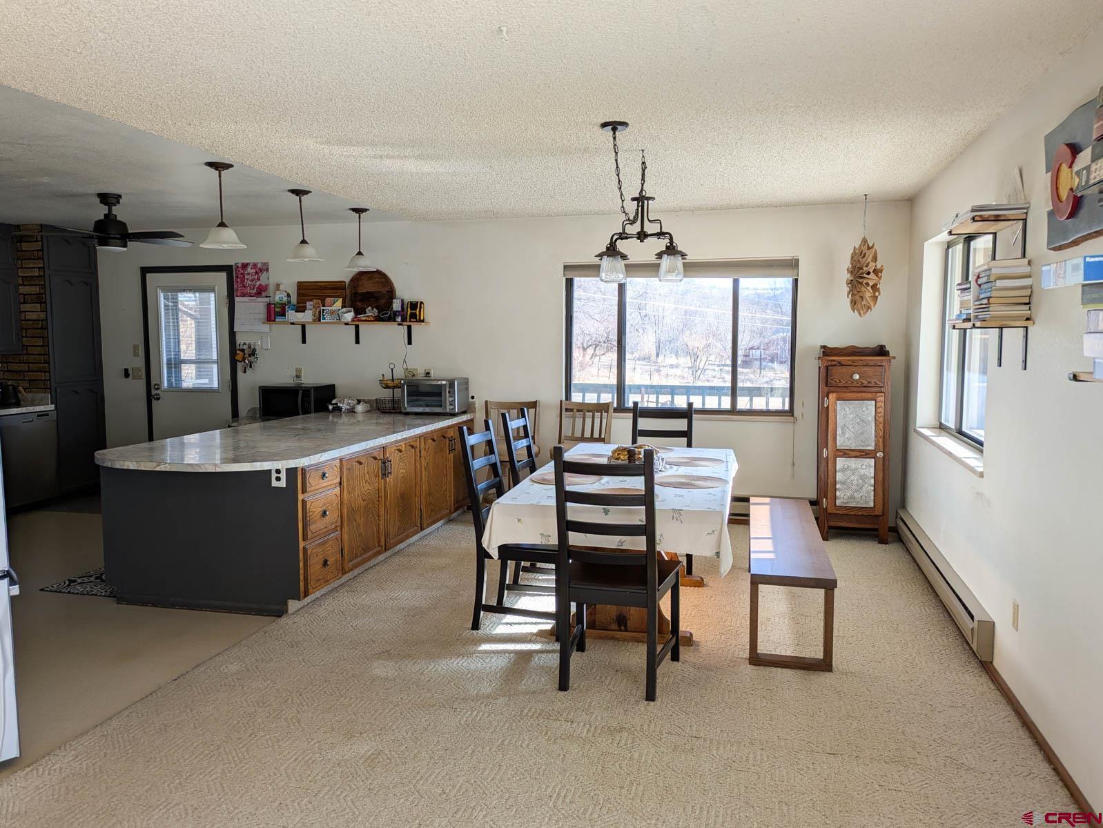 39594 Pitkin Road Paonia, CO 81428 - Photo 5 of 35 a dining room with furniture and window