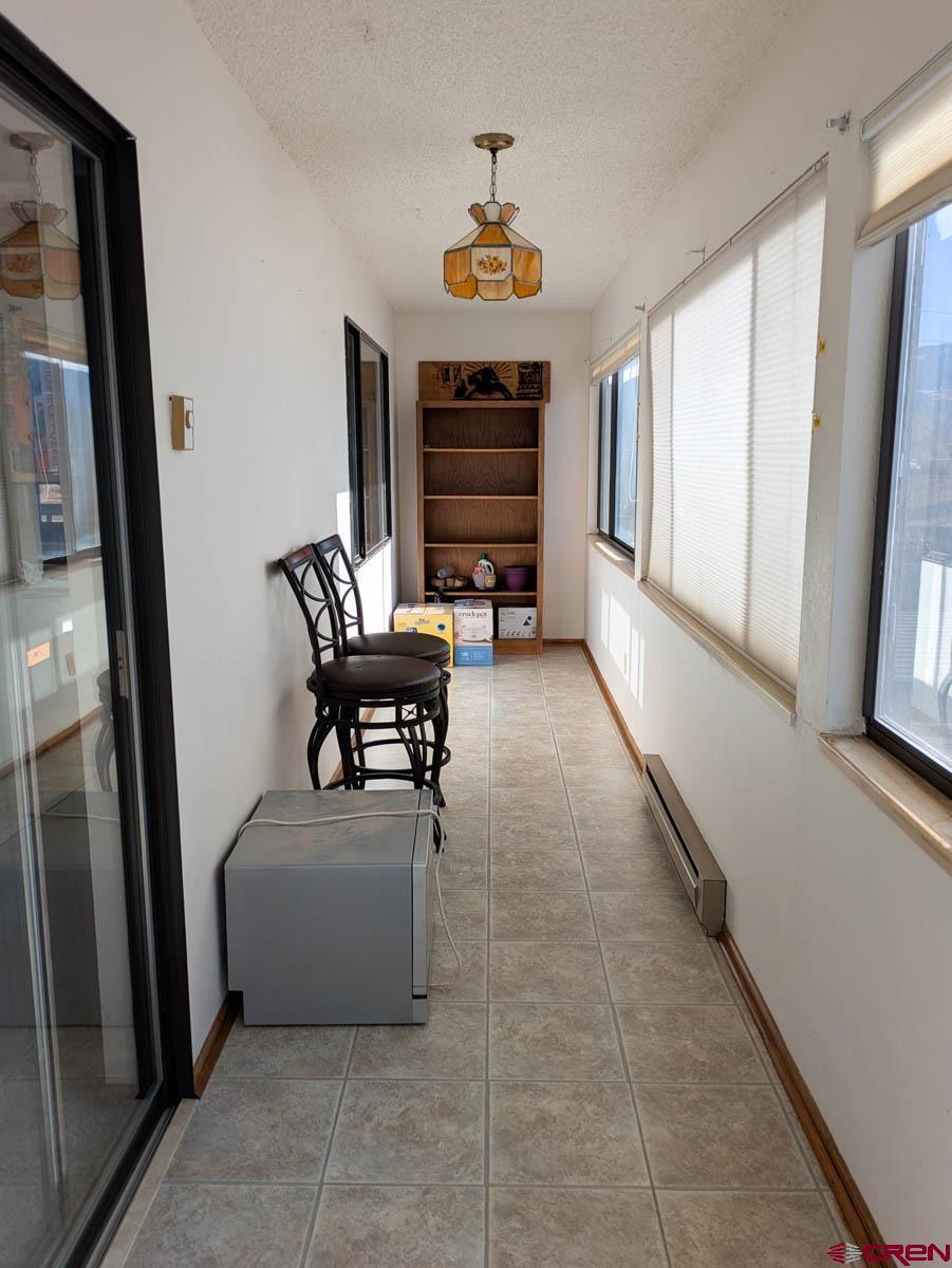 39594 Pitkin Road Paonia, CO 81428 - Photo 9 of 35 a living room with furniture and a window