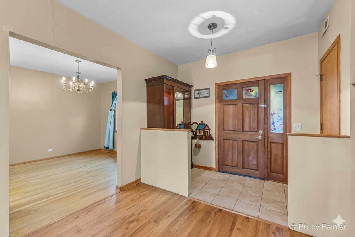 31 West Harrison Road Lombard, IL 60148 - Photo 2 of 31 a view of a livingroom with a furniture wooden floor and chandelier