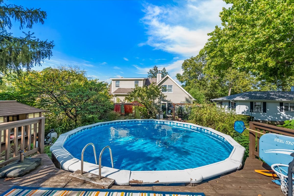 31 West Harrison Road Lombard, IL 60148 - Photo 29 of 31 a view of a swimming pool with a patio