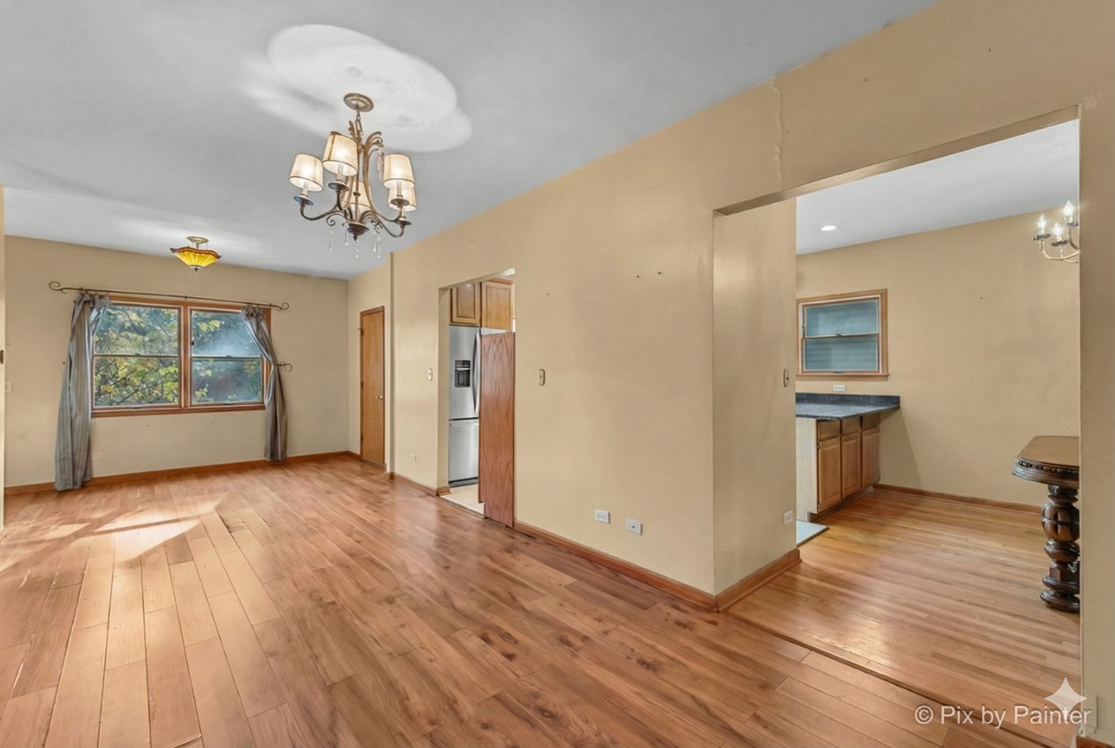 31 West Harrison Road Lombard, IL 60148 - Photo 3 of 31 a view of a room with wooden floors and natural light