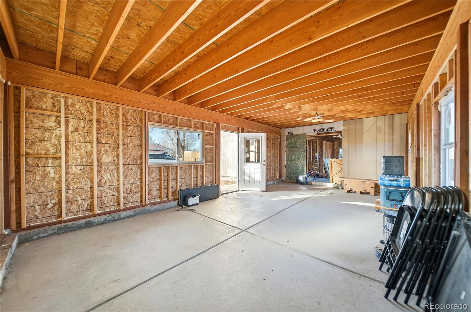 950 South Wolff Street Denver, CO 80219 - Photo 21 of 39 a view of an empty room with windows