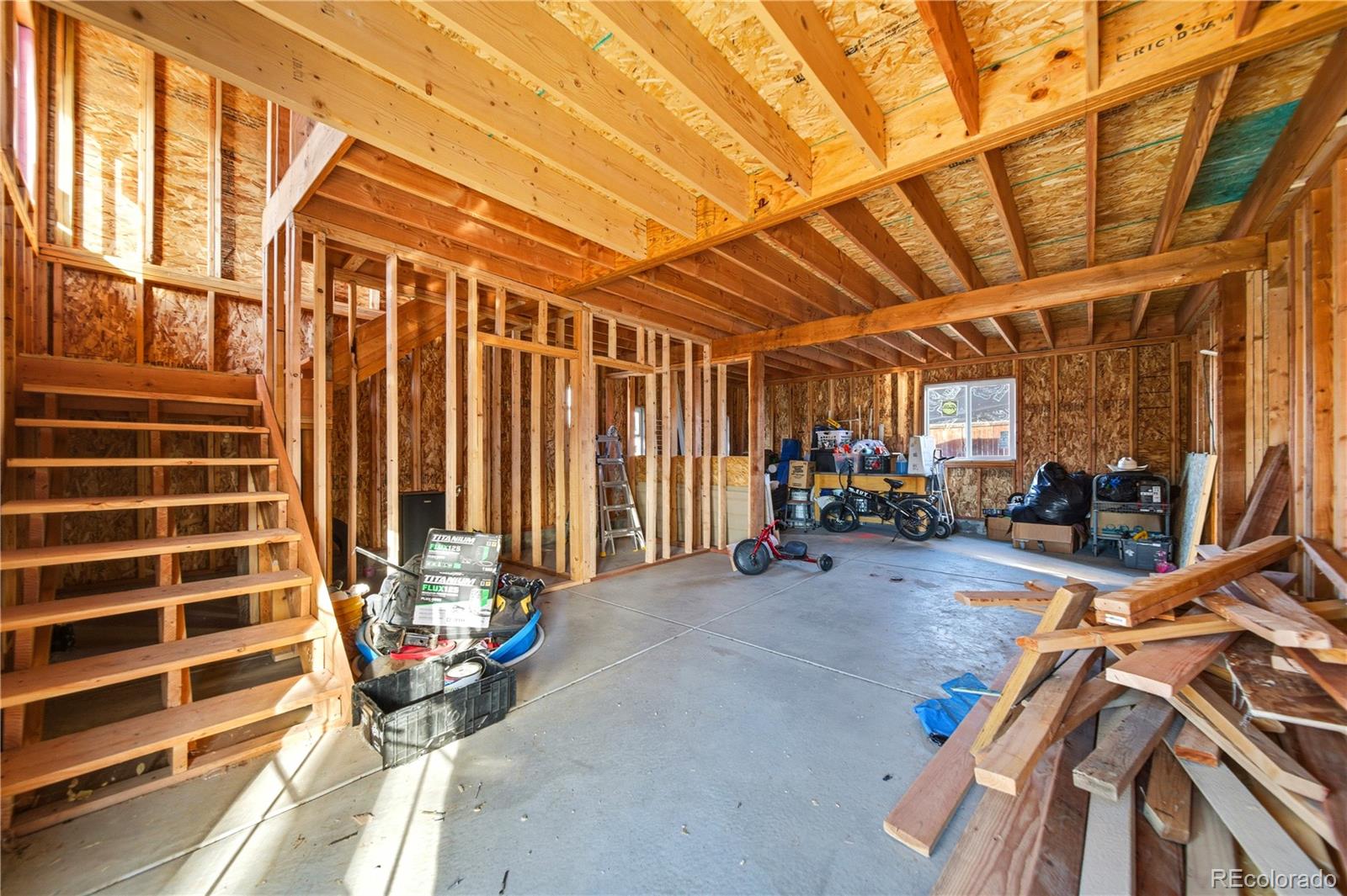 950 South Wolff Street Denver, CO 80219 - Photo 22 of 39 a view of a patio with table and chairs