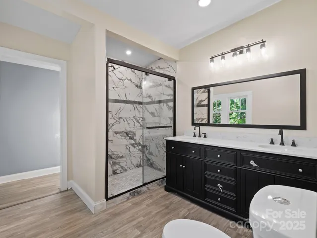a view of a kitchen from a hallway