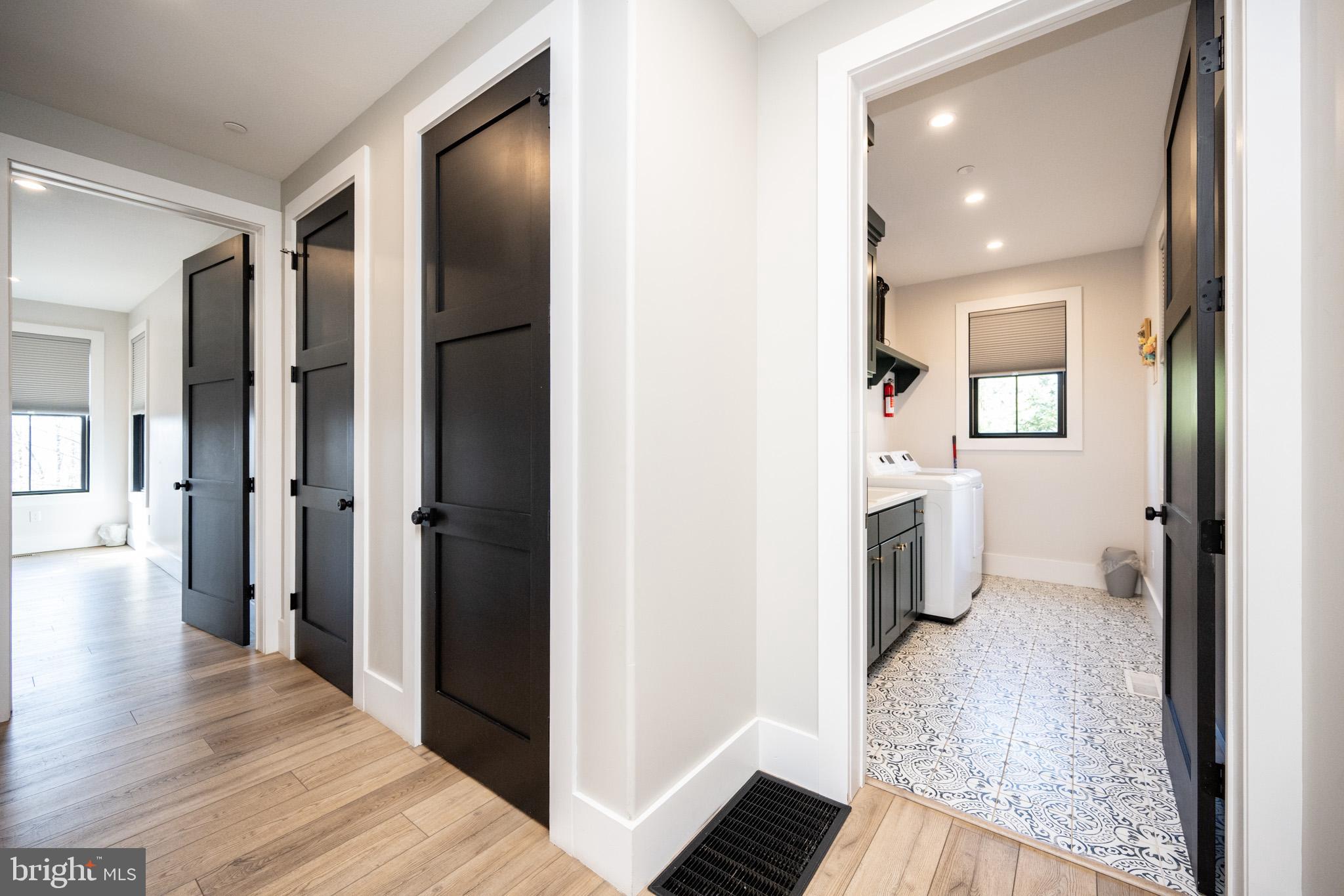 415 Mountaintop Road McHenry, MD 21541 - Photo 13 of 134 a view of a hallway with wooden floor and a living room
