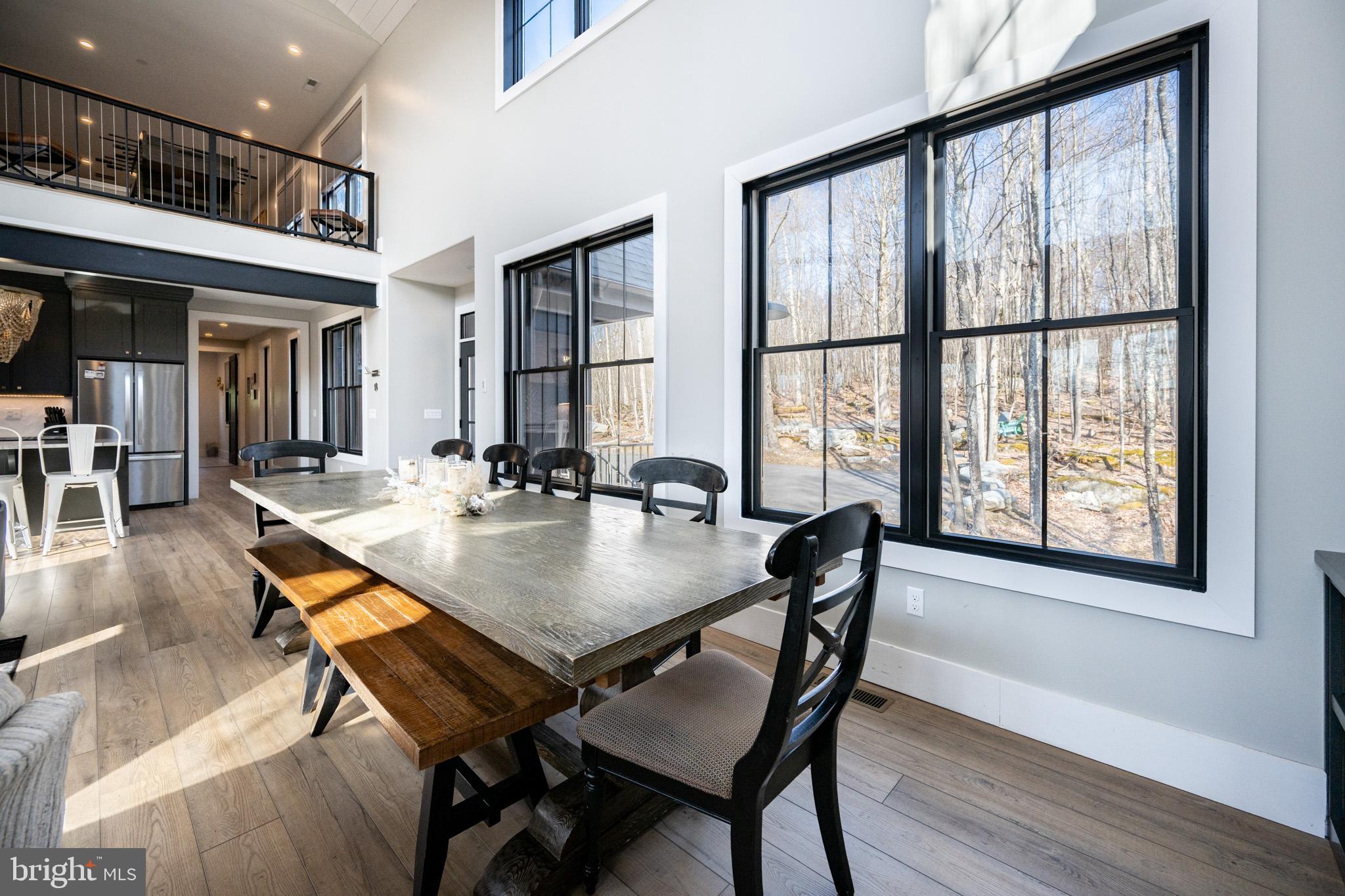 415 Mountaintop Road McHenry, MD 21541 - Photo 41 of 134 a dining room with furniture and window