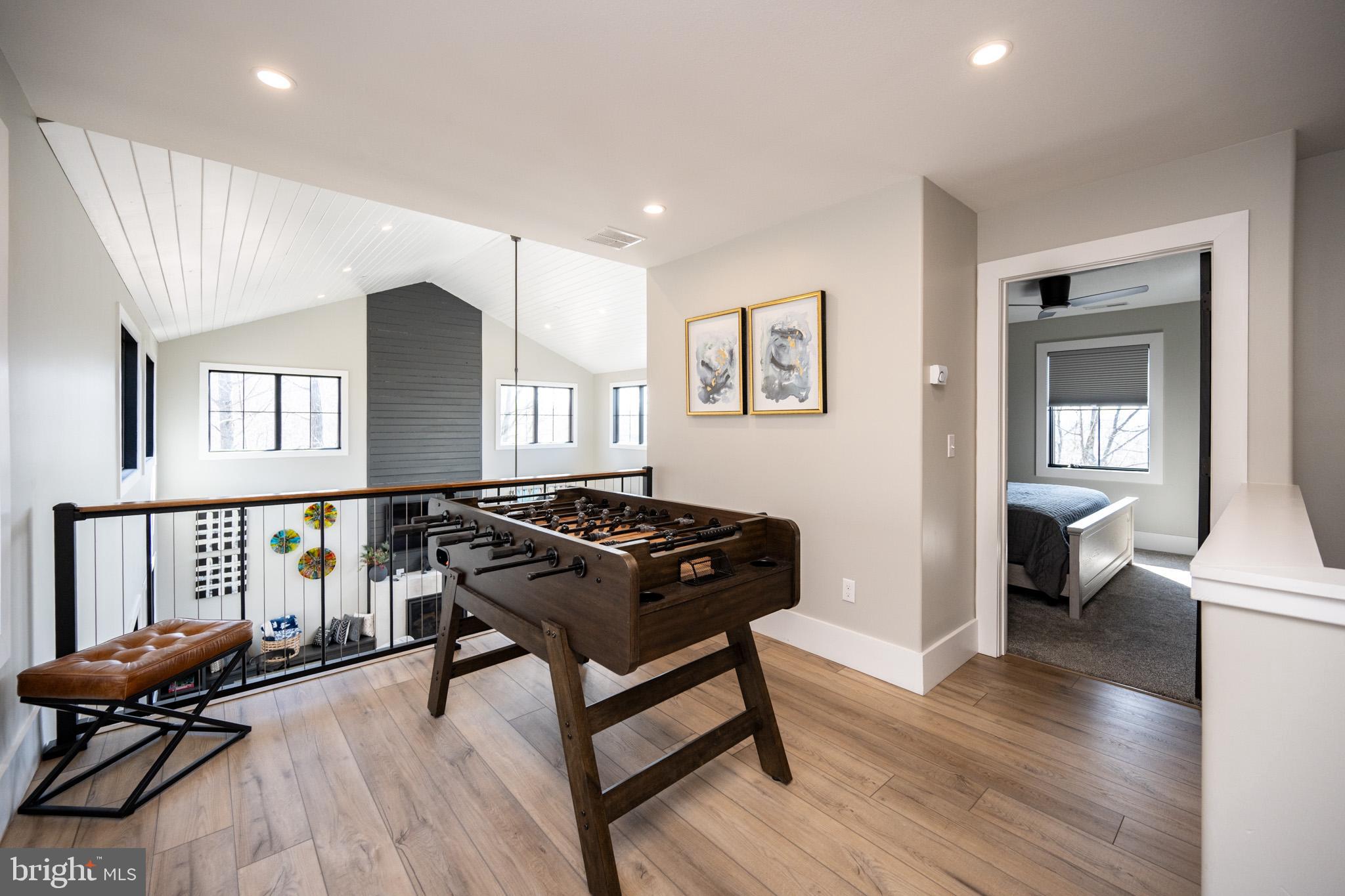 415 Mountaintop Road McHenry, MD 21541 - Photo 48 of 134 a living room with furniture and a wooden floor