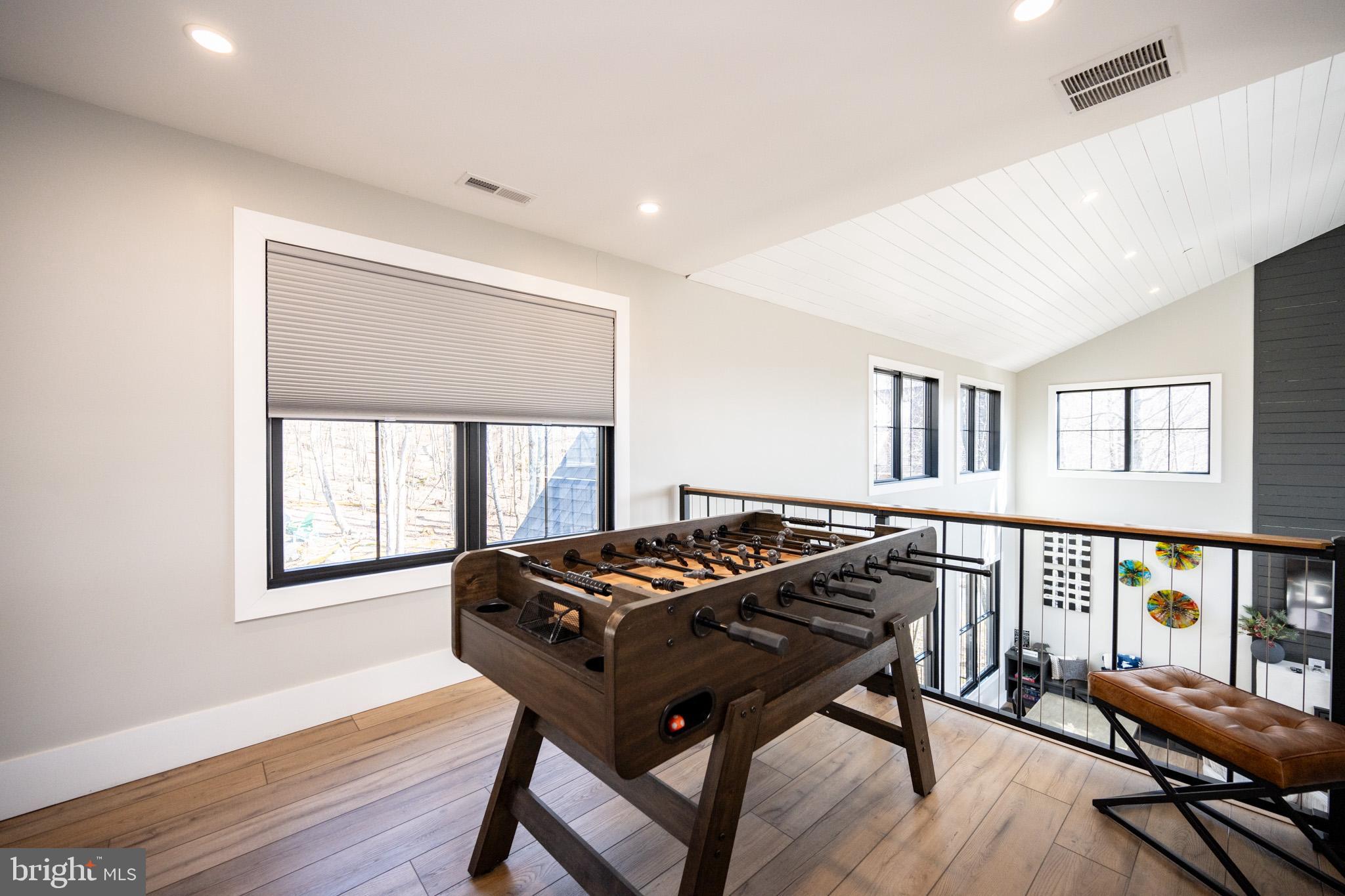 415 Mountaintop Road McHenry, MD 21541 - Photo 49 of 134 a living room with furniture and a wooden floor