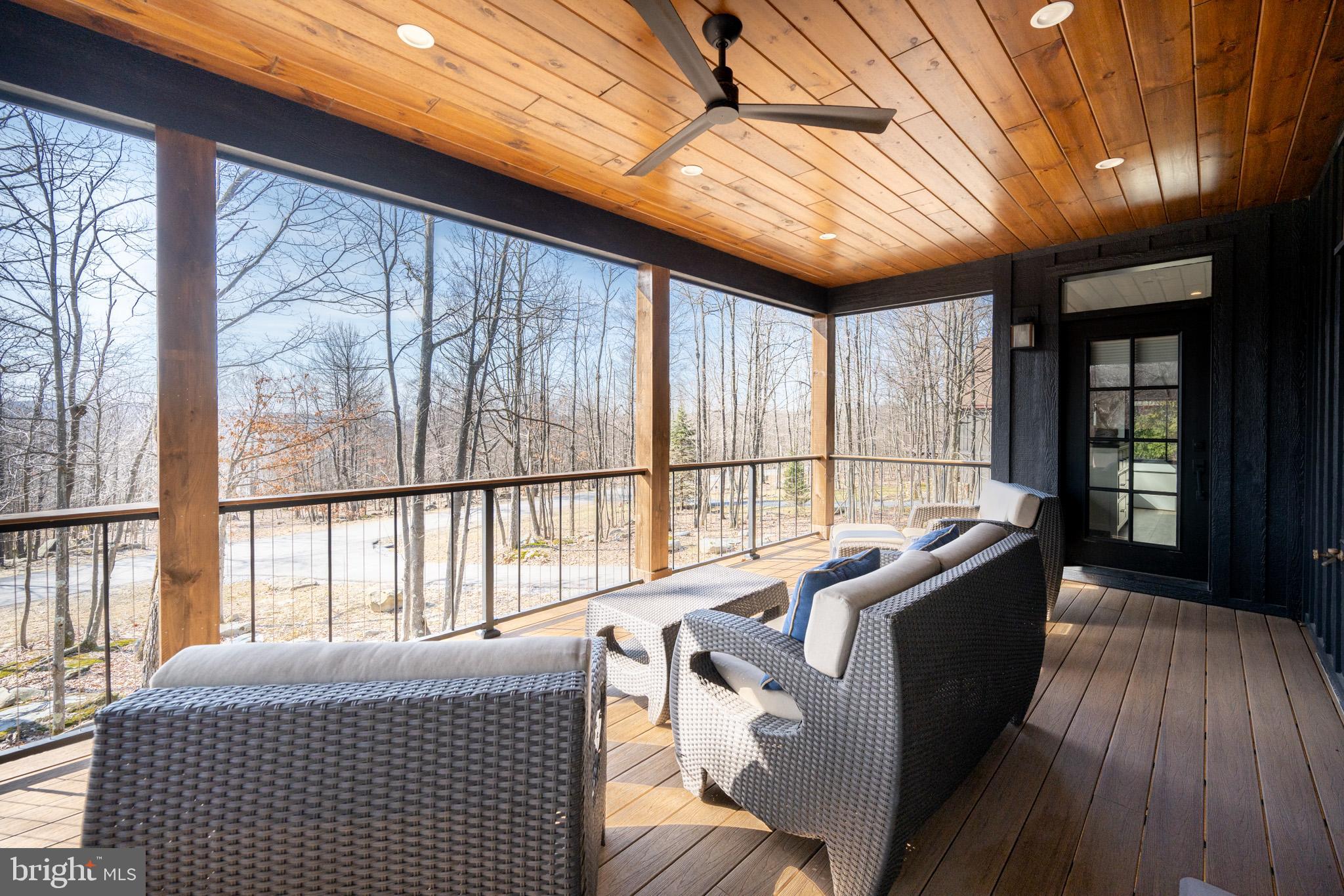 415 Mountaintop Road McHenry, MD 21541 - Photo 6 of 134 a living room with furniture and a bed