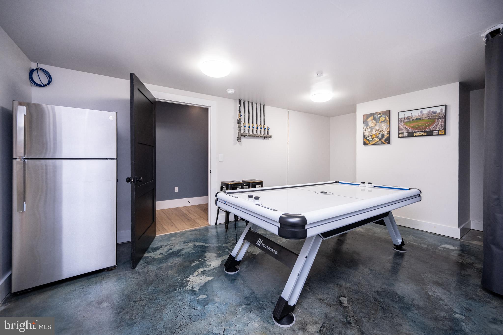 415 Mountaintop Road McHenry, MD 21541 - Photo 75 of 134 a room with furniture pool table and refrigerator