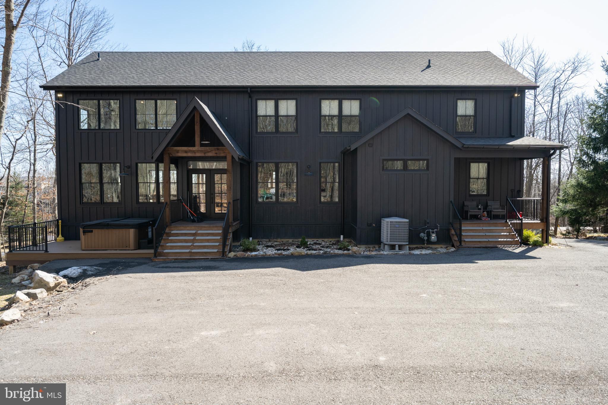 415 Mountaintop Road McHenry, MD 21541 - Photo 10 of 134 a front view of a house with a yard