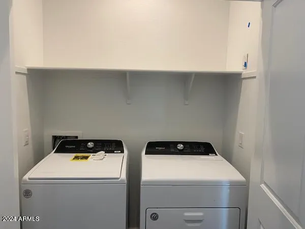a close up view of washer and dryer