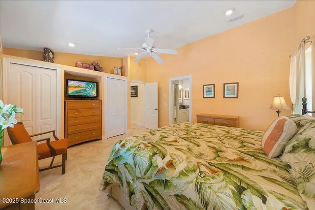 a bed room with a bed and a couch