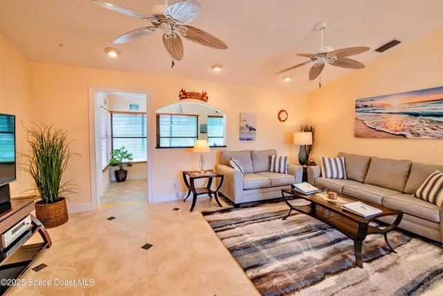 a kitchen with a sink and a stove next to a window