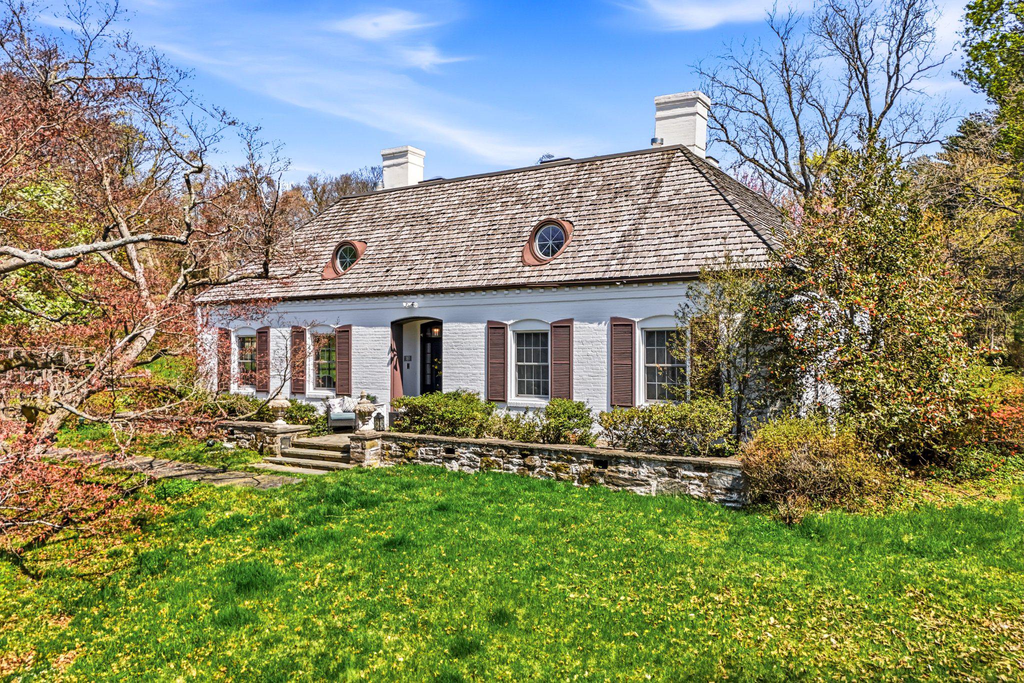 1735 Ashbourne Road Elkins Park, PA 19027 - Photo 2 of 82 a front view of a house with yard and green space