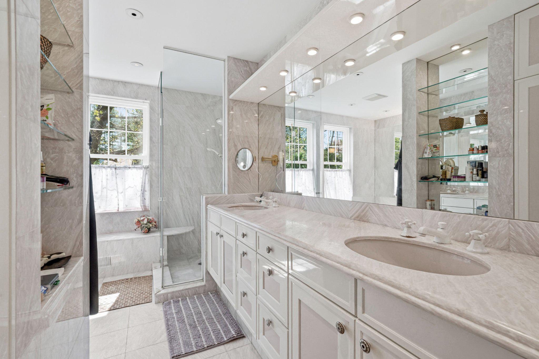 1735 Ashbourne Road Elkins Park, PA 19027 - Photo 30 of 82 Primary bathroom with custom cabinetry.