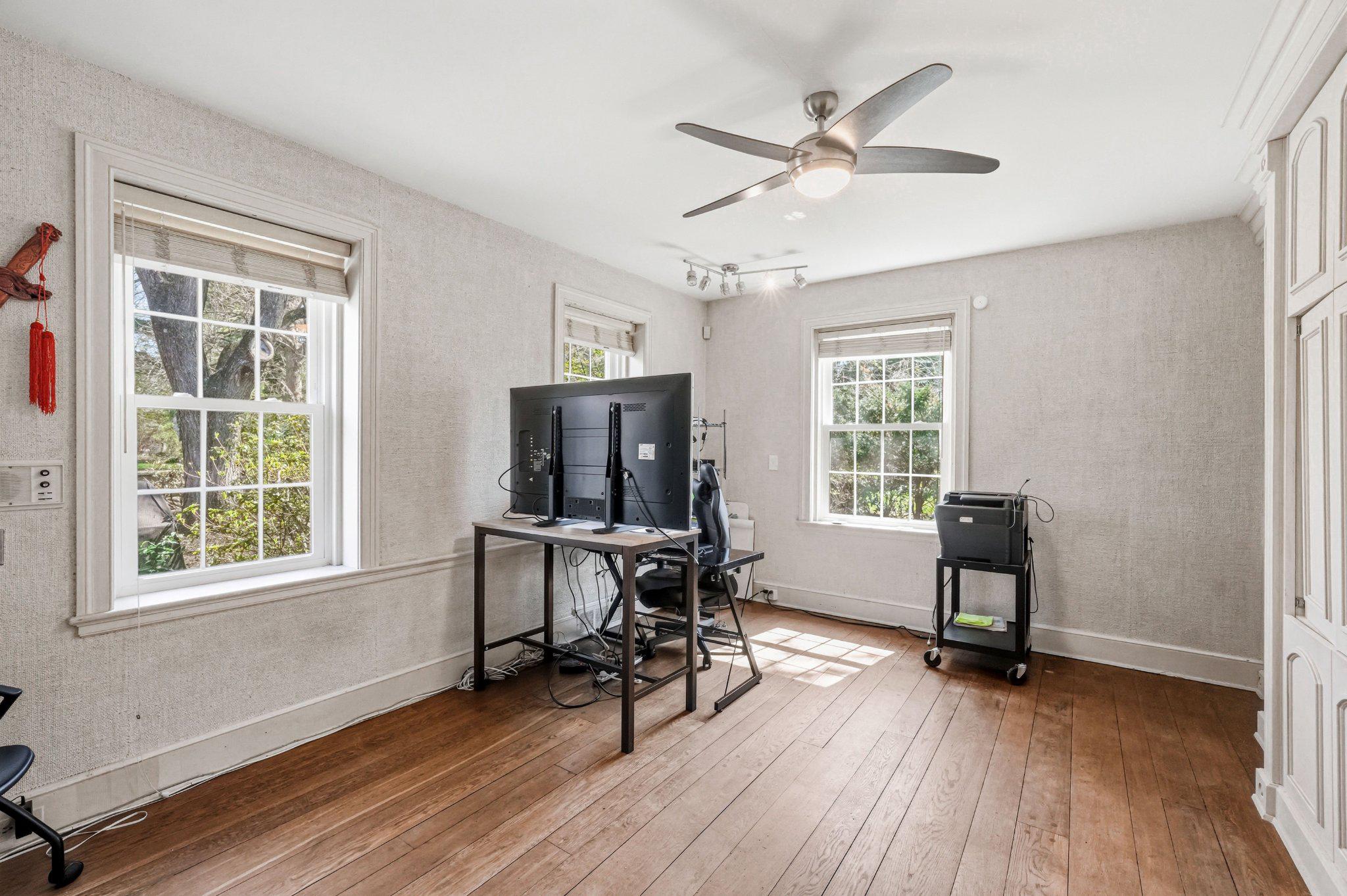 1735 Ashbourne Road Elkins Park, PA 19027 - Photo 33 of 82 a view of a workspace with furniture and a window