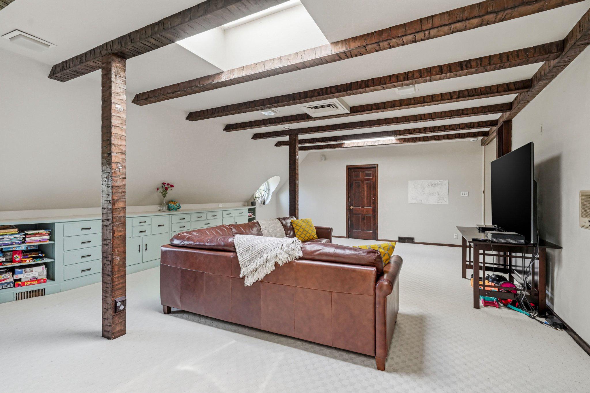 1735 Ashbourne Road Elkins Park, PA 19027 - Photo 38 of 82 a living room with furniture and a flat screen tv