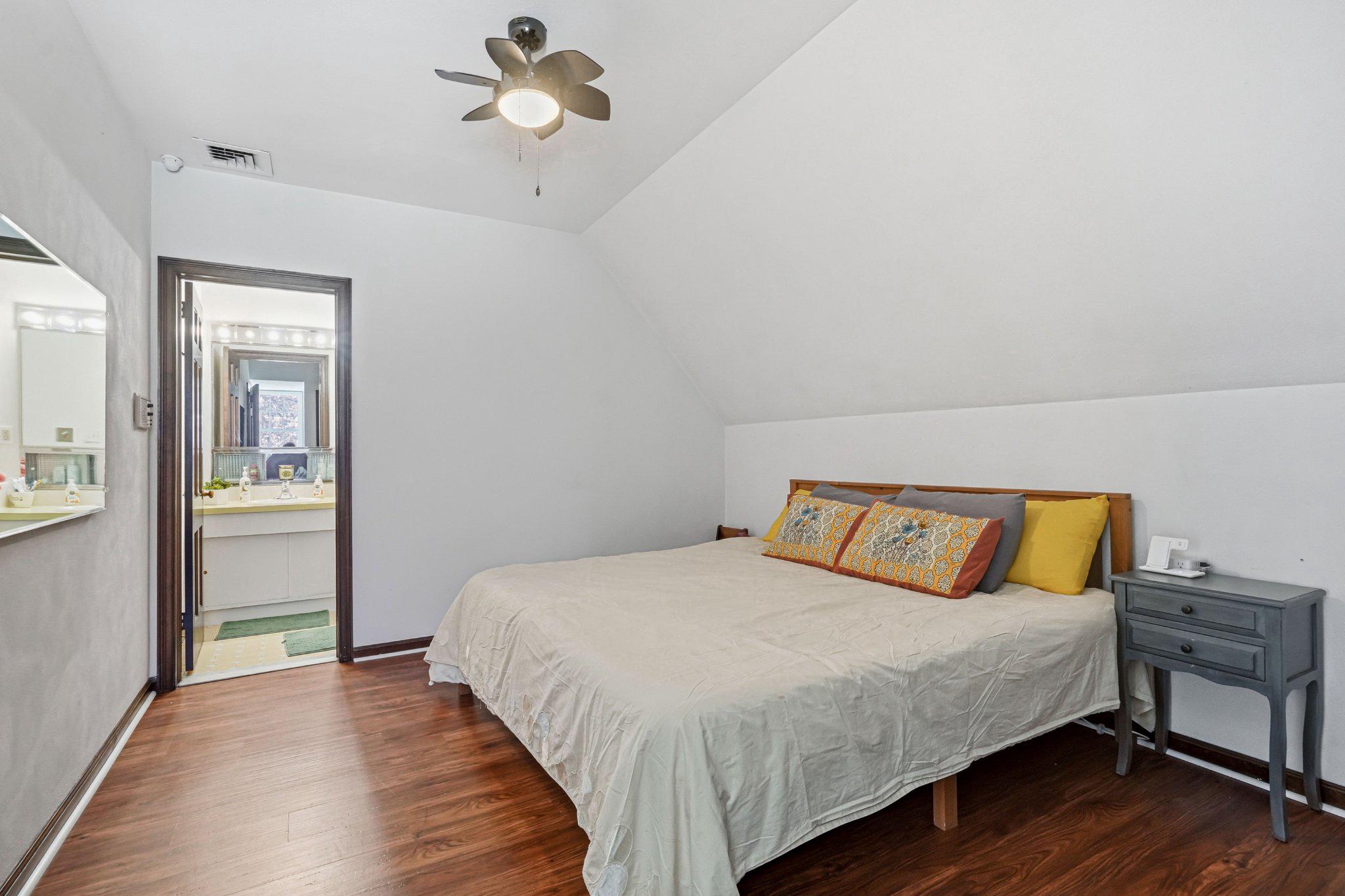 1735 Ashbourne Road Elkins Park, PA 19027 - Photo 48 of 82 a bedroom with a bed and wooden floor