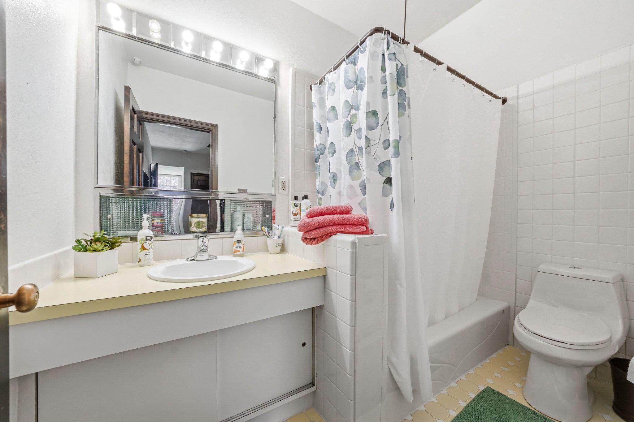 1735 Ashbourne Road Elkins Park, PA 19027 - Photo 49 of 82 a bathroom with a sink toilet and shower