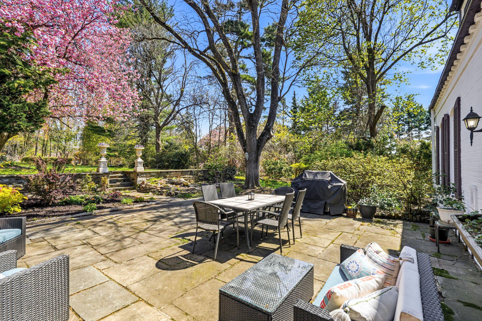1735 Ashbourne Road Elkins Park, PA 19027 - Photo 54 of 82 a view of a patio with table and chairs and potted plants