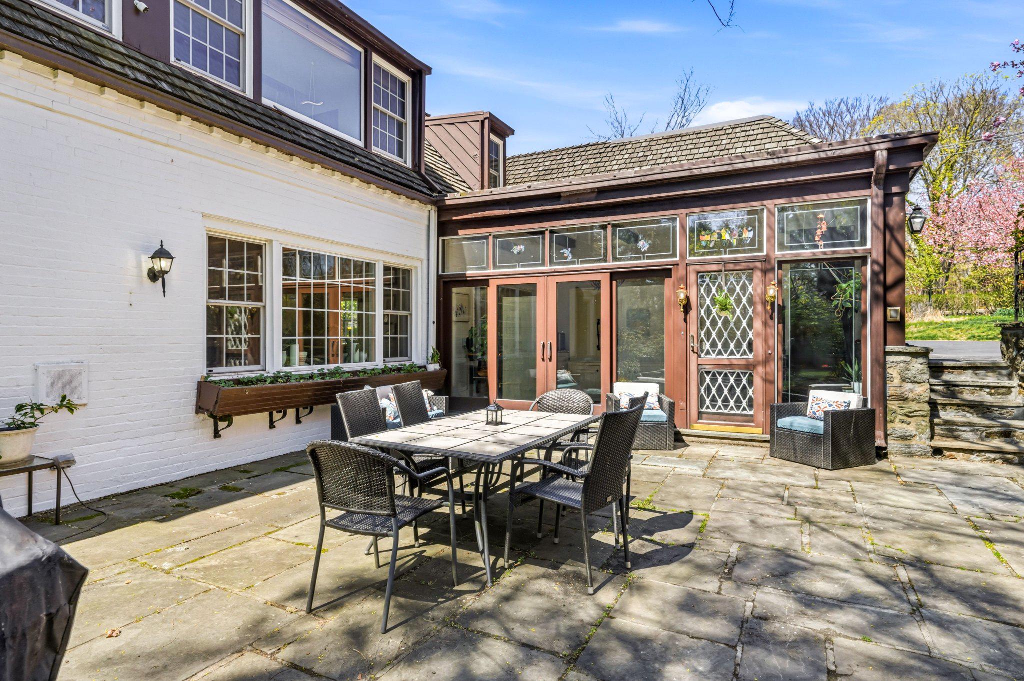 1735 Ashbourne Road Elkins Park, PA 19027 - Photo 55 of 82 a view of a dinning table and chairs in the patio