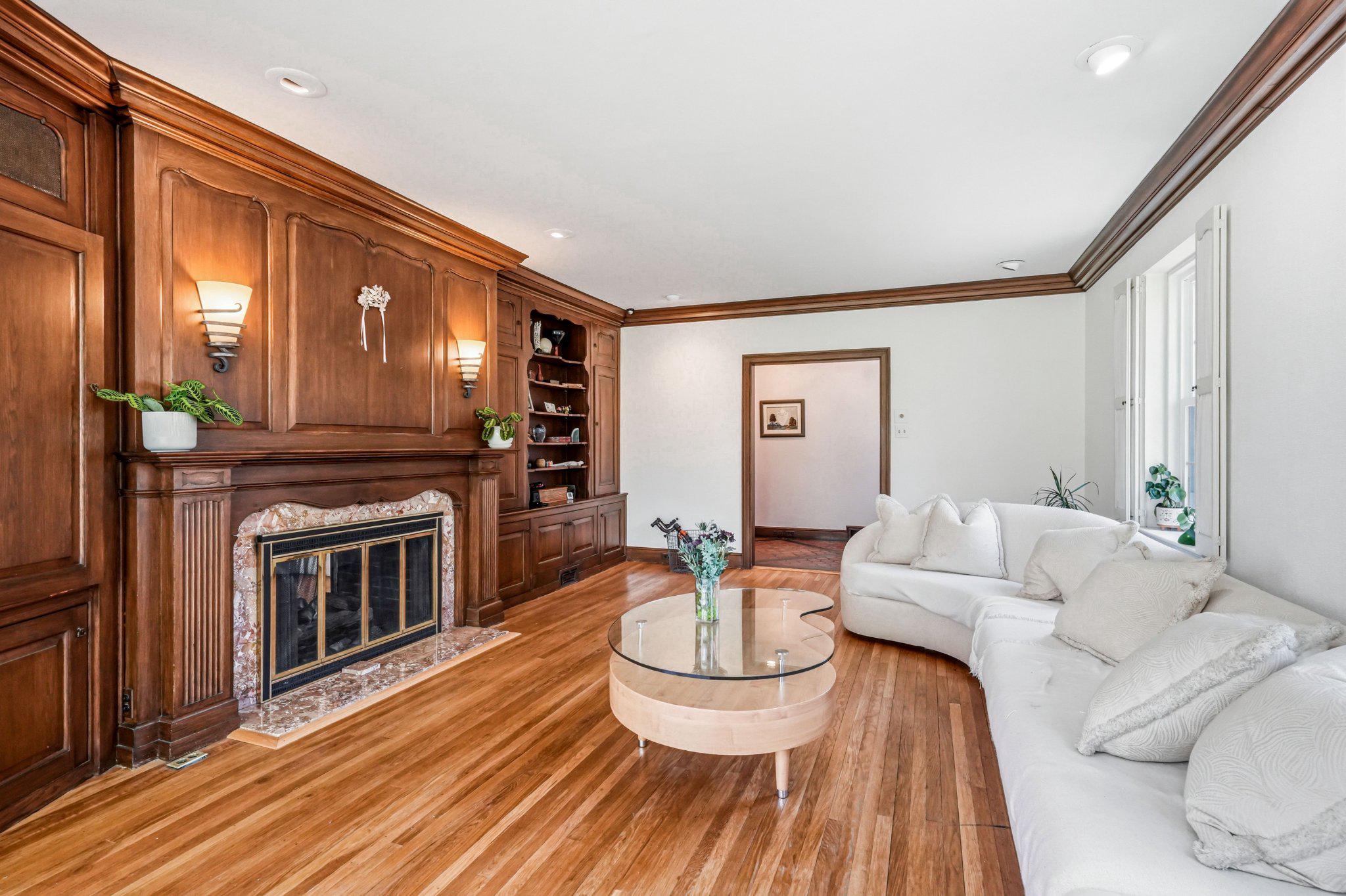 1735 Ashbourne Road Elkins Park, PA 19027 - Photo 7 of 82 a living room with furniture and a fireplace