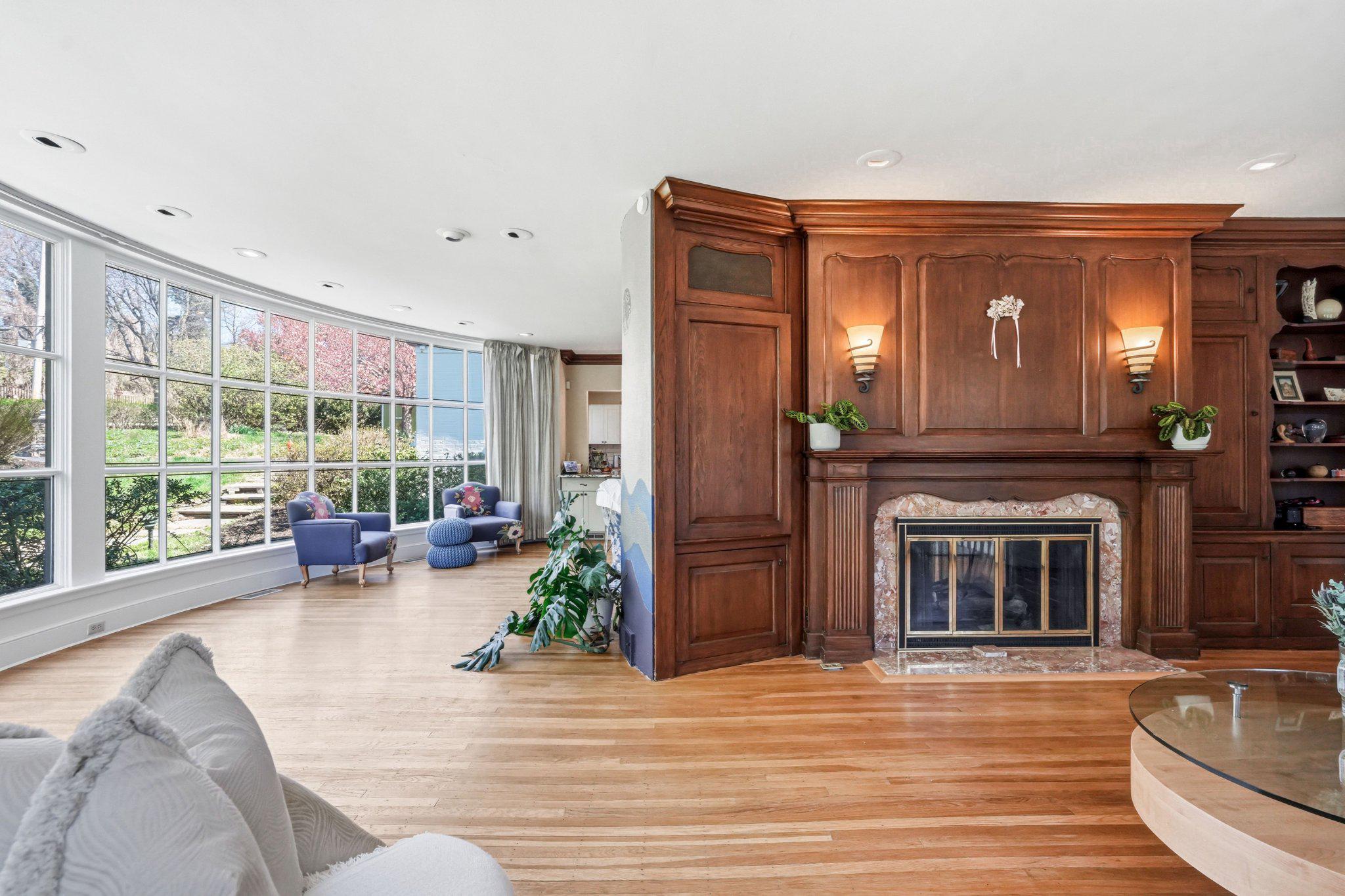 1735 Ashbourne Road Elkins Park, PA 19027 - Photo 8 of 82 a living room with furniture and a fireplace