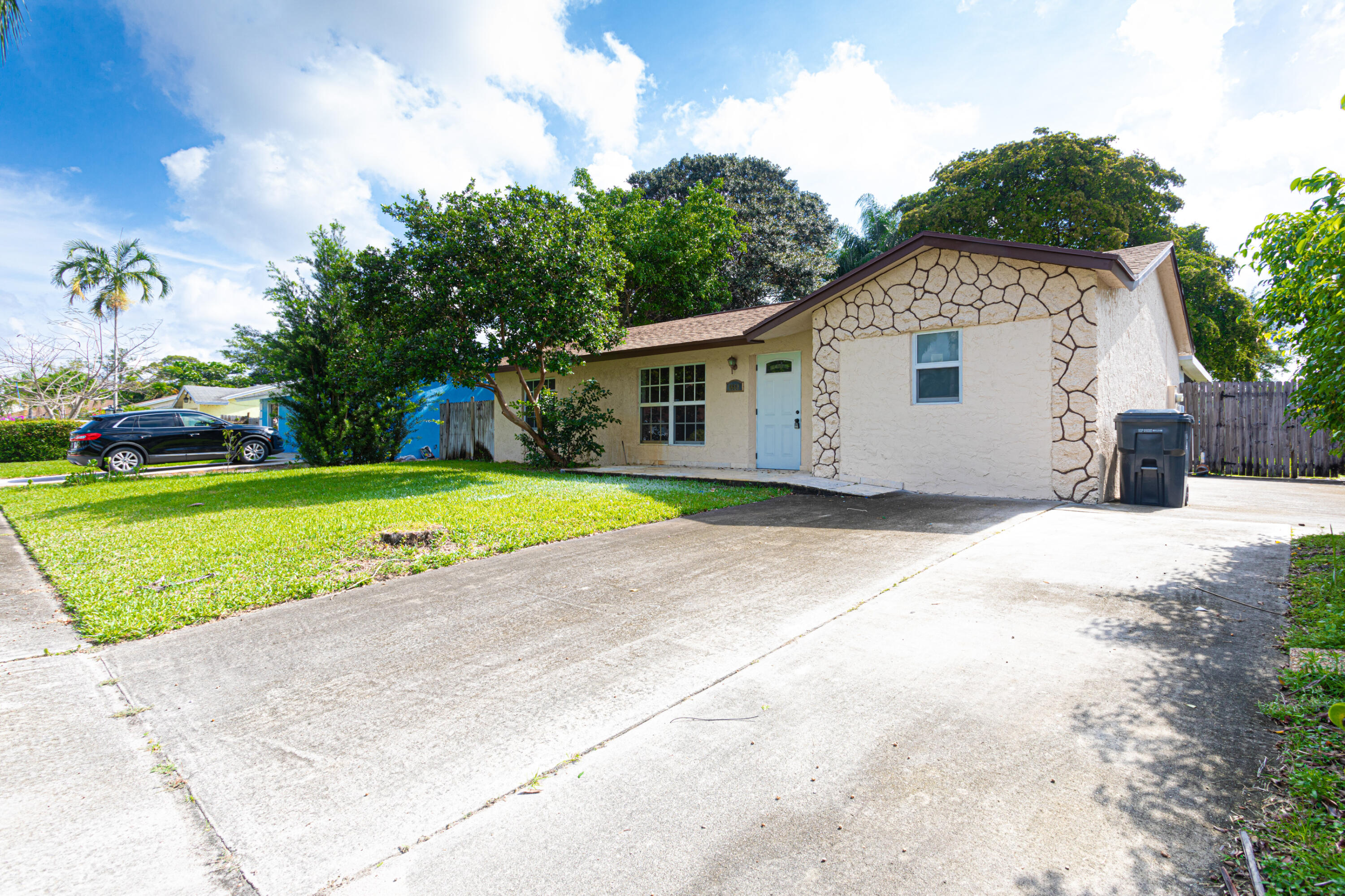 4661 Poseidon Place Lake Worth, FL 33463 - Photo 12 of 36 a view of a house with a backyard