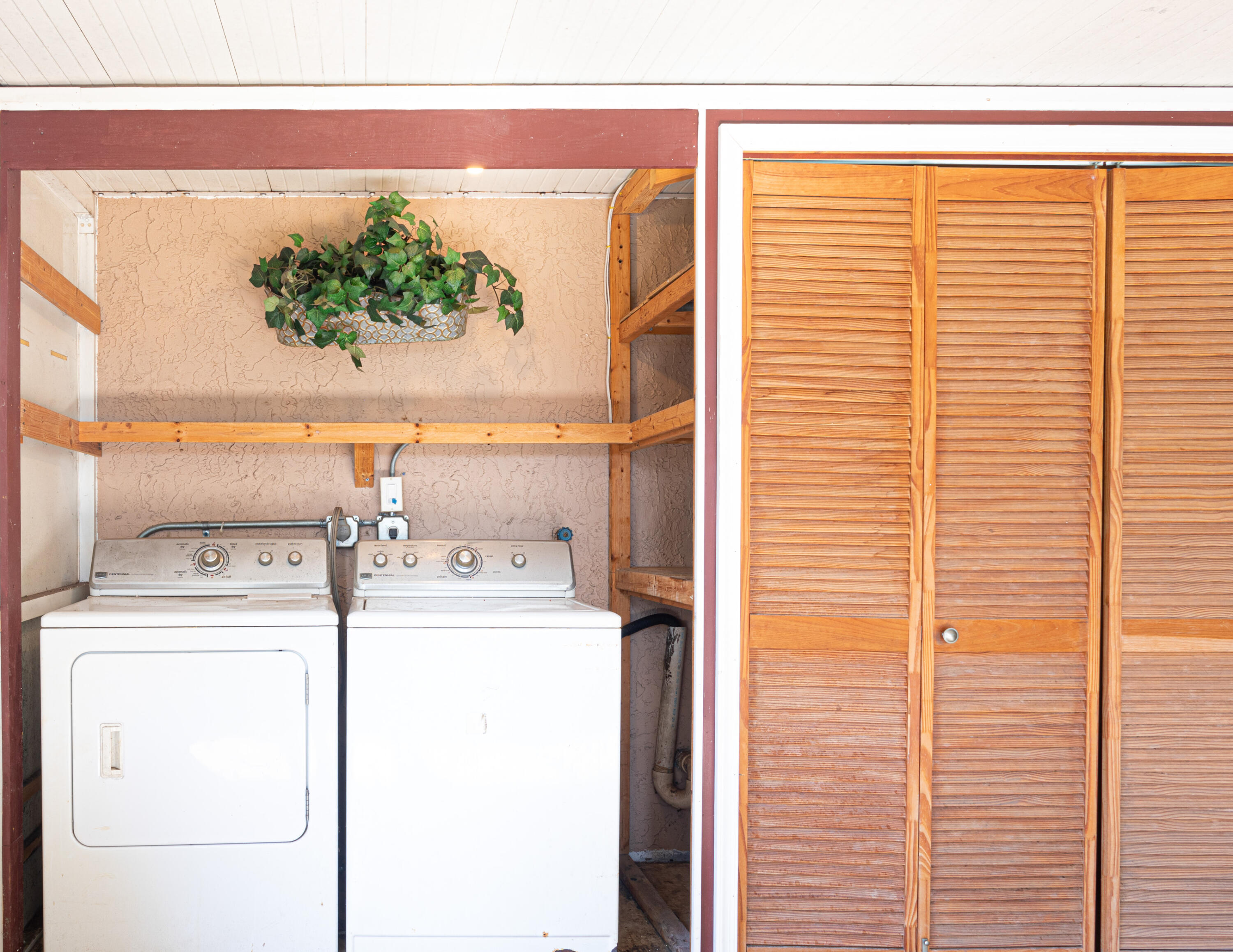 4661 Poseidon Place Lake Worth, FL 33463 - Photo 20 of 36 a utility room with a washer and dryer