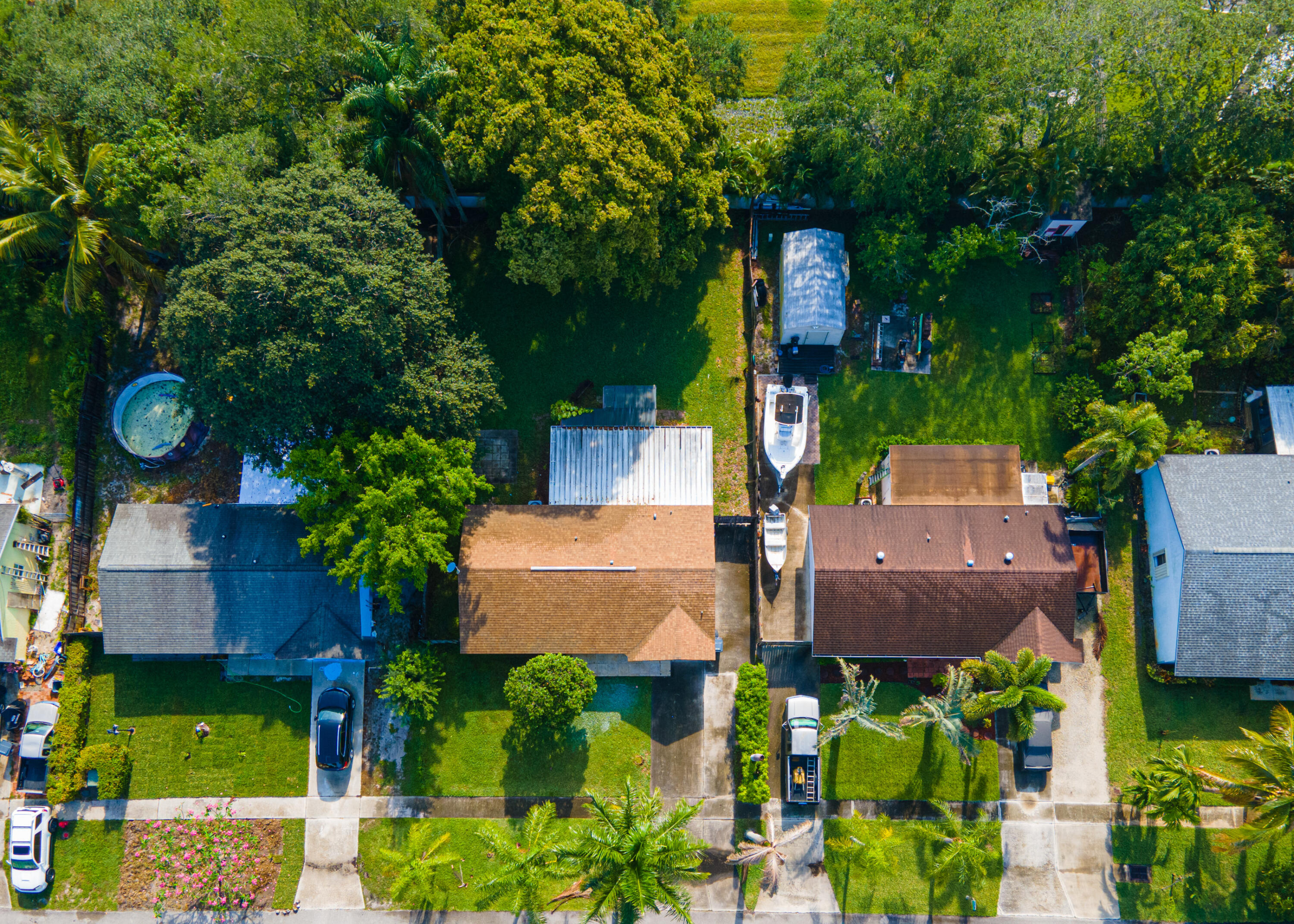 4661 Poseidon Place Lake Worth, FL 33463 - Photo 2 of 36 an aerial view of a house with garden space and street view