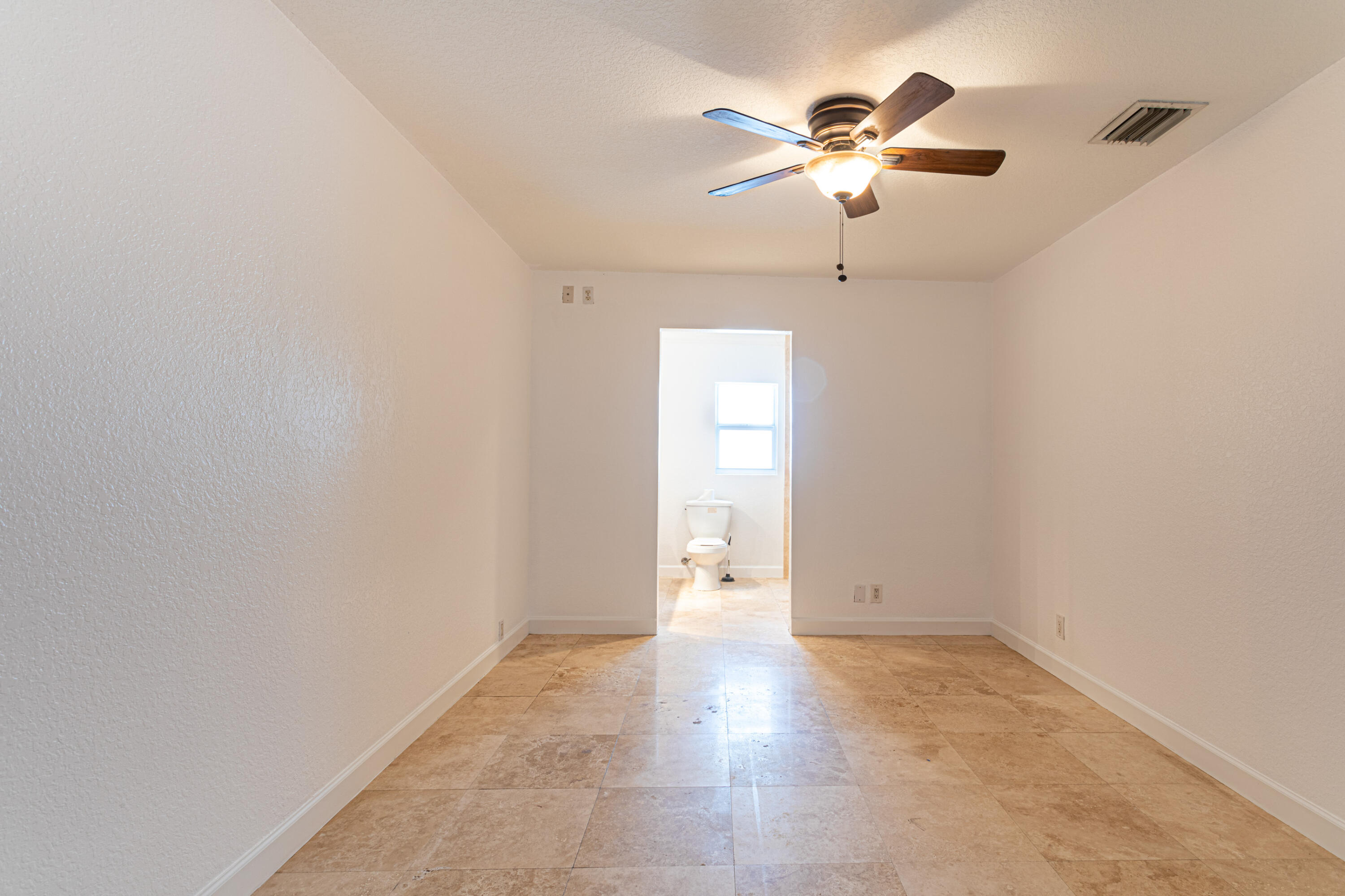 4661 Poseidon Place Lake Worth, FL 33463 - Photo 29 of 36 a view of an empty room