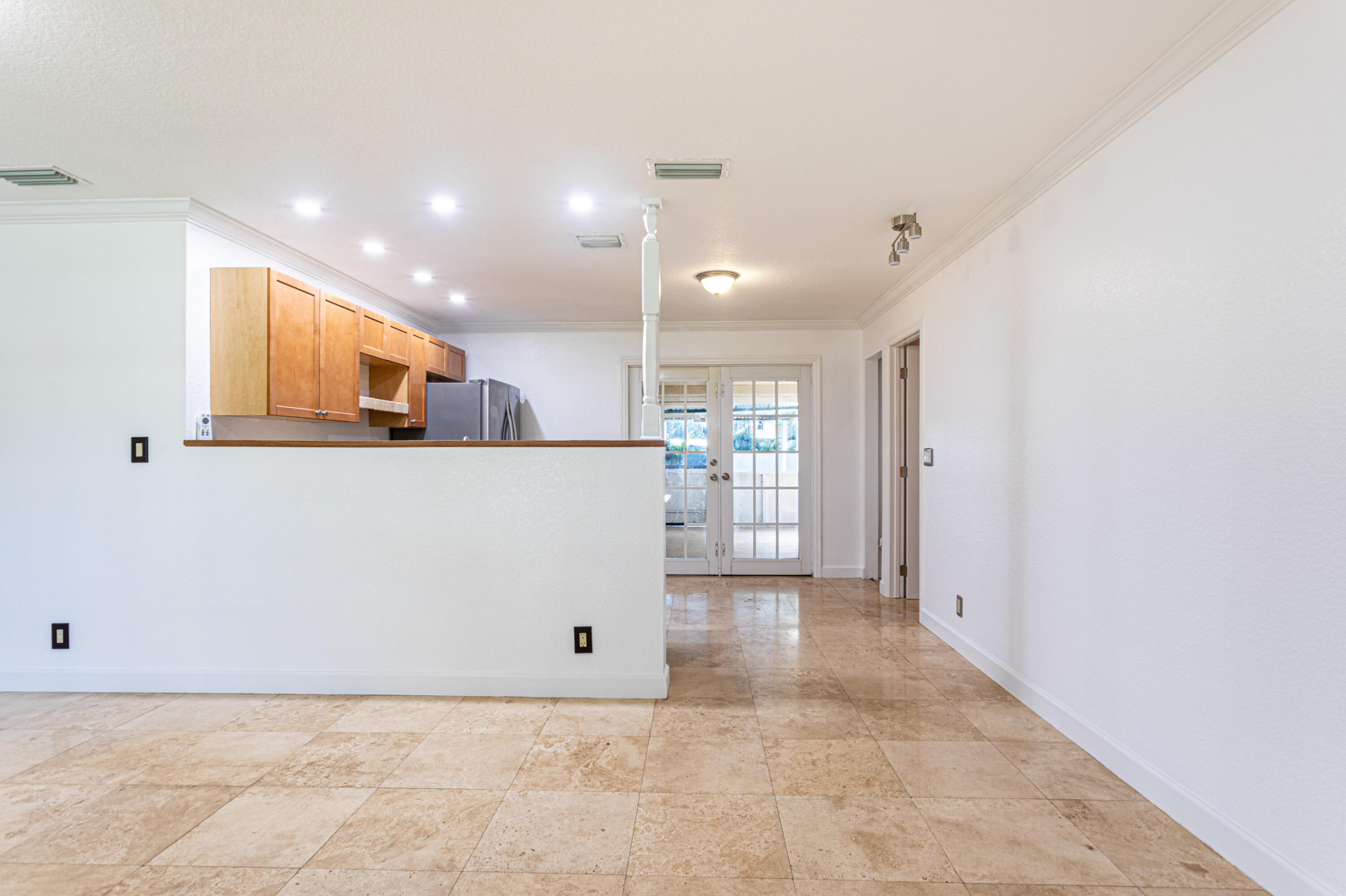 4661 Poseidon Place Lake Worth, FL 33463 - Photo 33 of 36 a view of kitchen with refrigerator and window