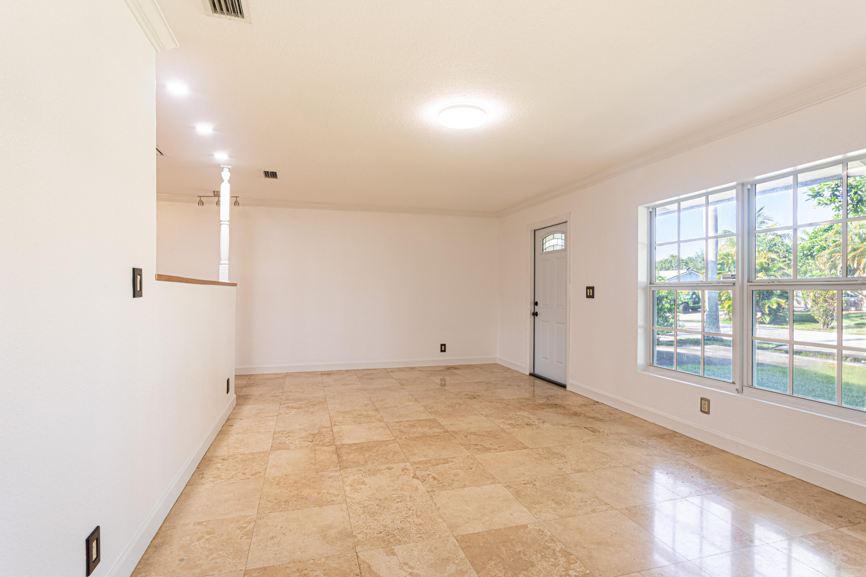 4661 Poseidon Place Lake Worth, FL 33463 - Photo 35 of 36 a view of an empty room with a window