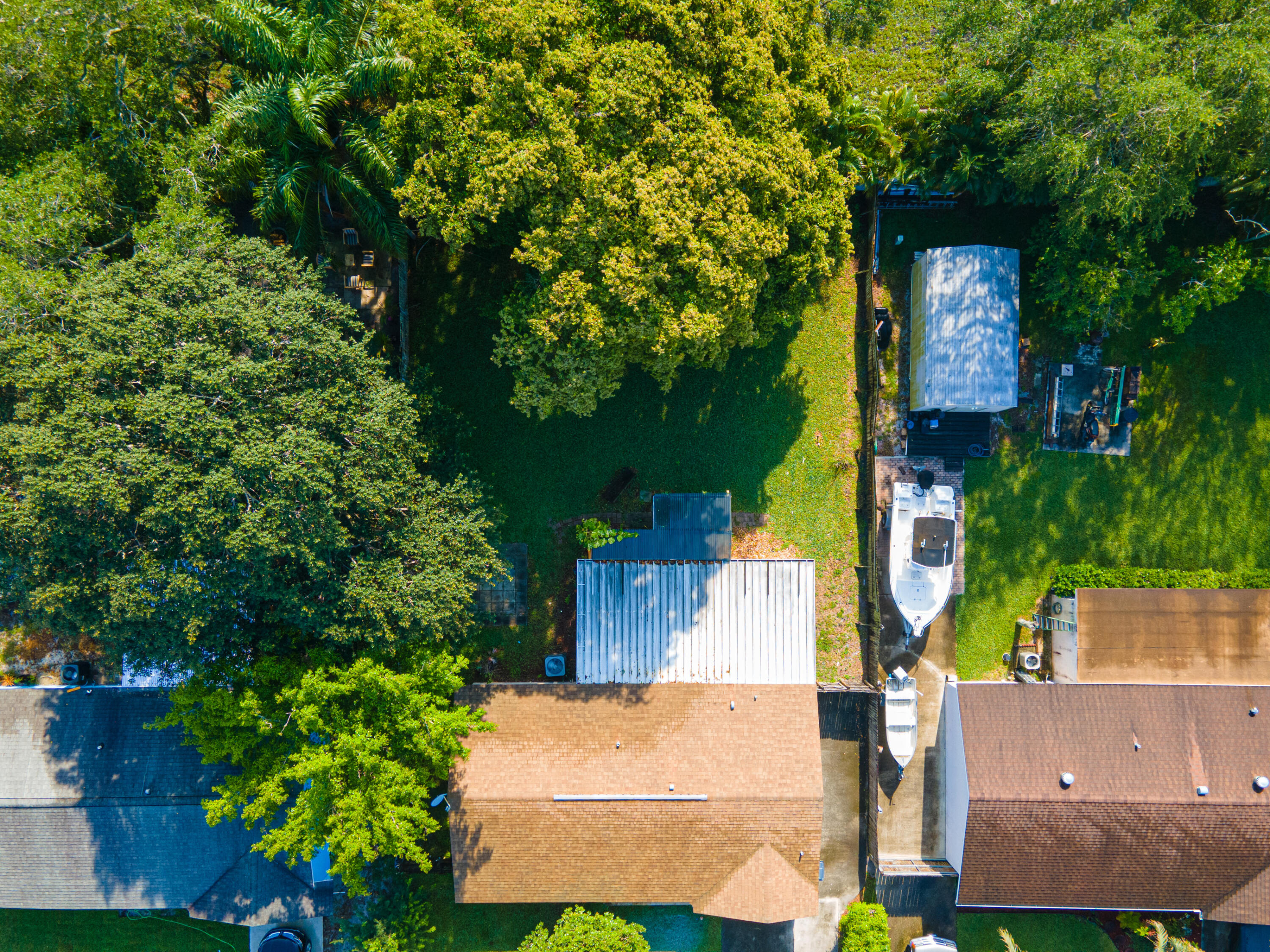 4661 Poseidon Place Lake Worth, FL 33463 - Photo 7 of 36 an aerial view of a house with a yard