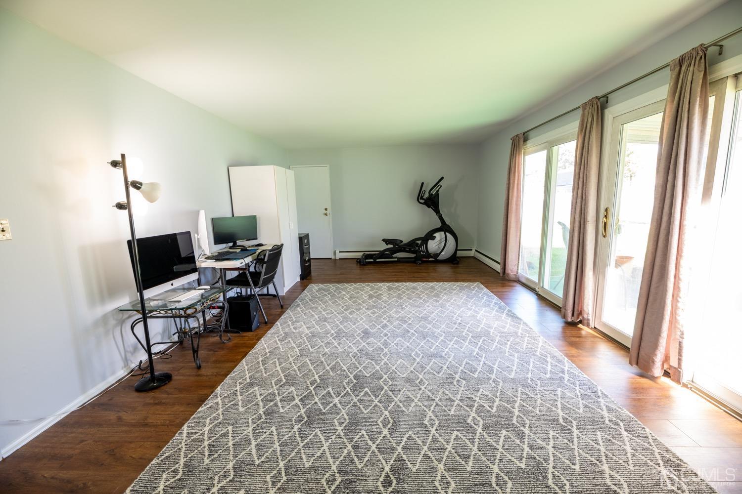 15 Sims Road Edison, NJ 08817 - Photo 54 of 63 a living room with furniture rug and a large window