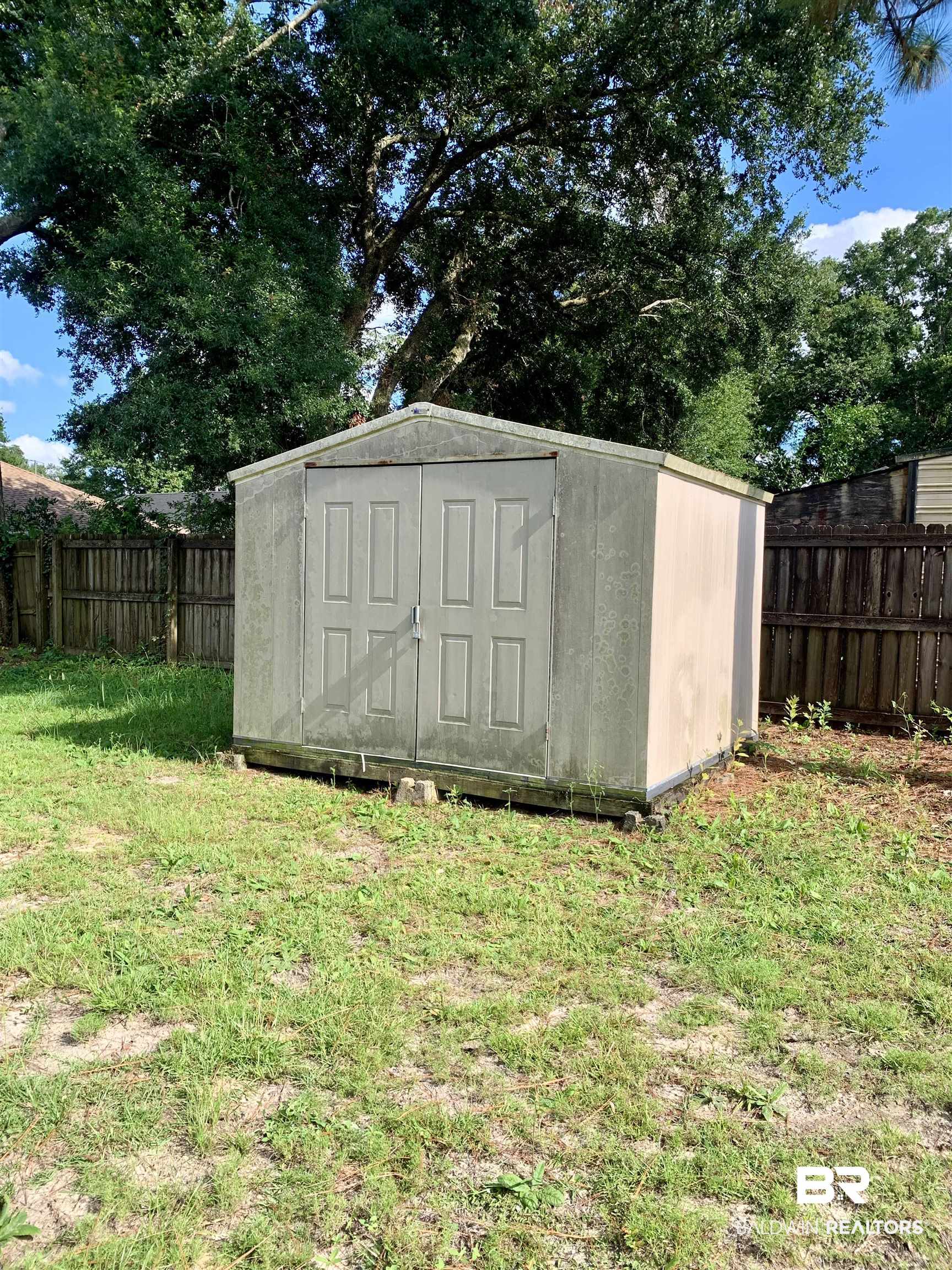 2710 West Road Mobile, AL 36693 - Photo 9 of 10 View of outdoor structure with a lawn